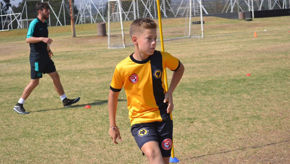 Boy Kicking Ball International