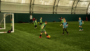 Boy Holding Ball Uk Socer Schools